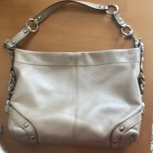 Coach bag,  11" x 8"  no flaws lavender inside pearly cream color silver
